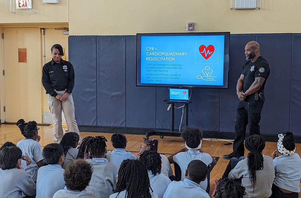 CPR instruction at Chicago Jesuit Academy