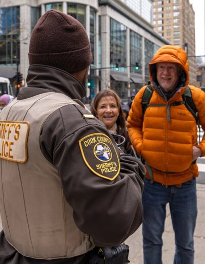 Officer talking with people on the street