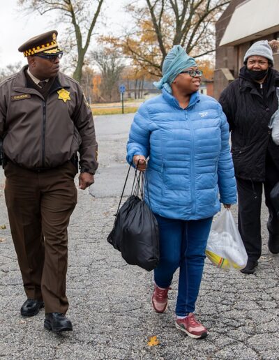 Participants leaving the Thanksgiving Turkey Giveaway