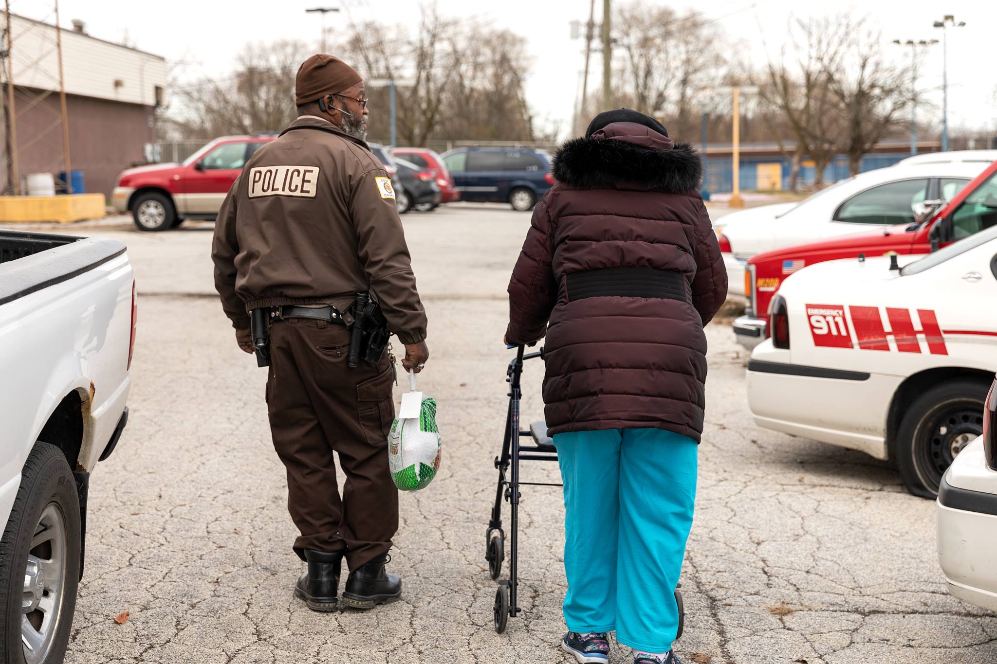 Officer assisting a senior in Ford Heights